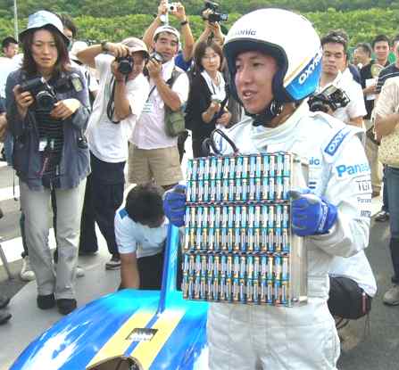 Takashi Sudo holding Panasonic battery pack Oxyride