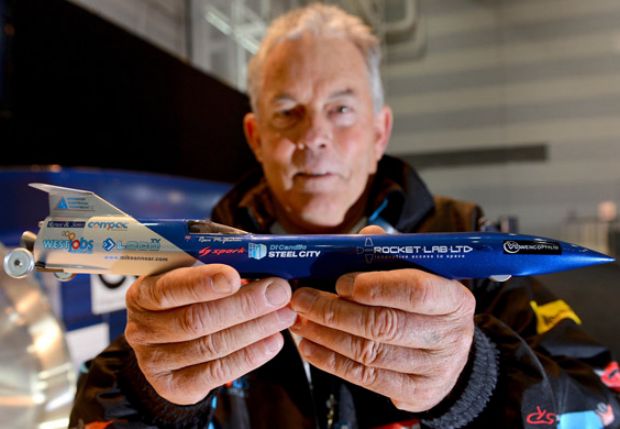 Rosco McGlashan holding a model of the Aussie Invader