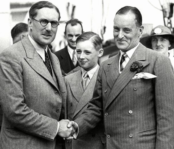 Malcolm Campbell shakes a sponsors hand